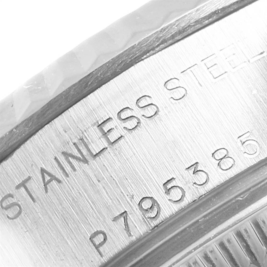 This image shows a close-up of the side of the Stainless Steel caseback with the model number on a Rolex Datejust 79174 Women's Stainless Steel Pink Dial 79174 Women's Stainless Steel Pink Dial watch.