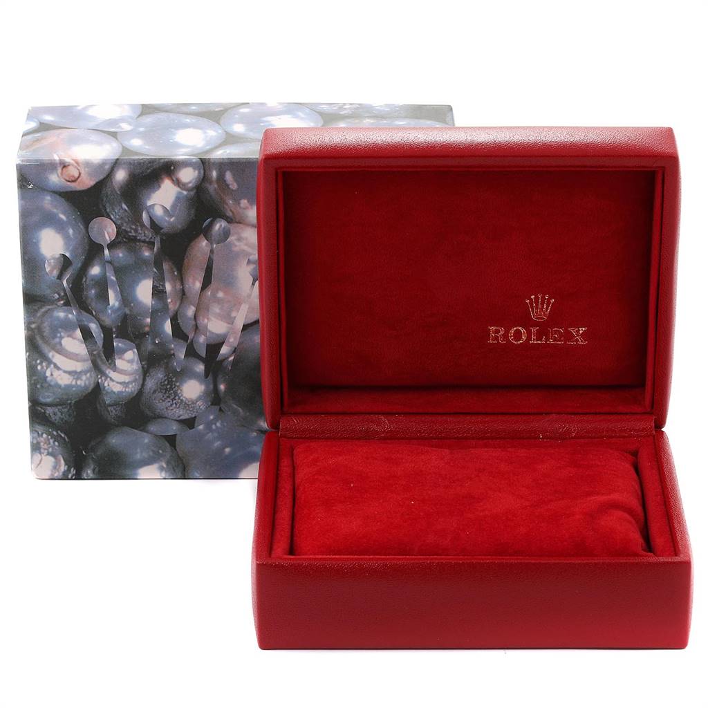 This image shows the open red leather box for a Rolex Datejust 79174 Women's Stainless Steel Pink Dial 79174 Women's Stainless Steel Pink Dial model, prominently displaying the branded interior.