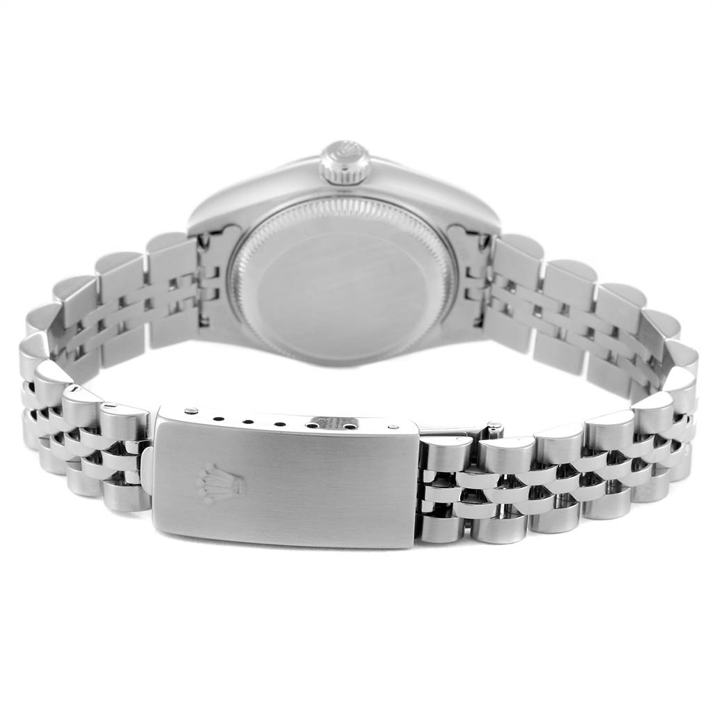 The image shows the back case, crown, and bracelet clasp of a Rolex Datejust 79174 Women's Stainless Steel Pink Dial 79174 Women's Stainless Steel Pink Dial watch from a rear angle.