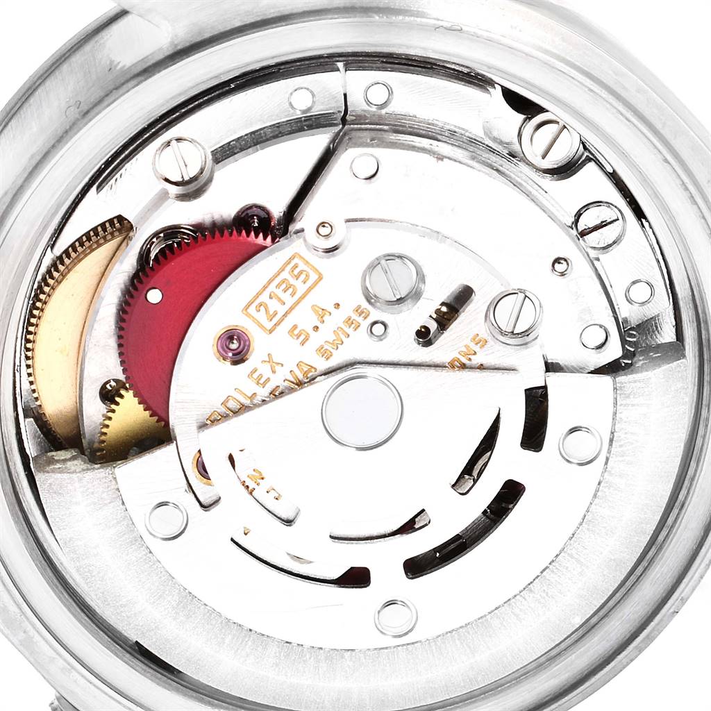 This image shows the intricate internal mechanism of a Rolex Datejust 69174 Women
s Stainless Steel Silver Dial 69174 Women
s Stainless Steel Silver Dial watch, viewed from the back.