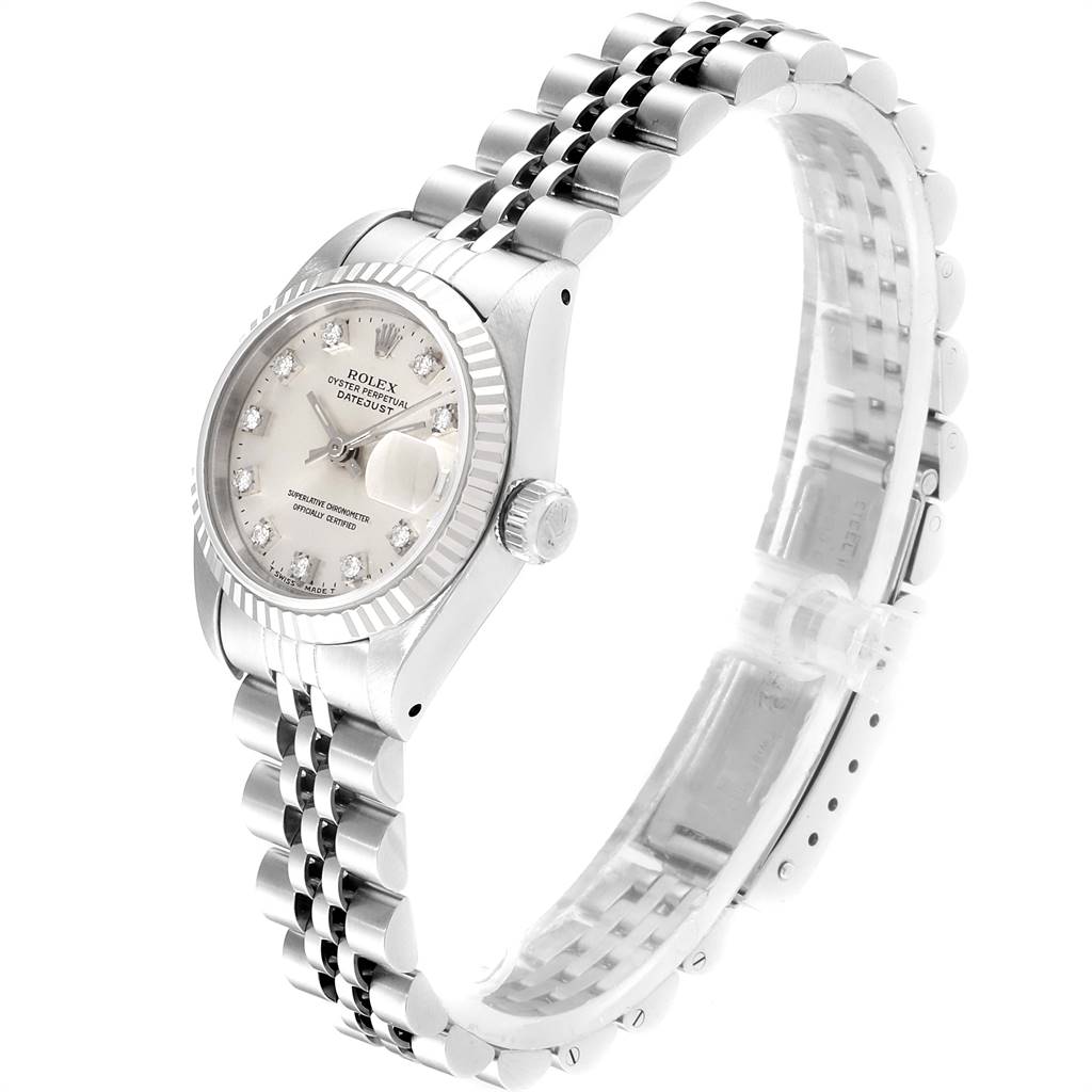 This side angle shows the face, bezel, case, crown, and bracelet of the Rolex Datejust 69174 Women
s Stainless Steel Silver Dial 69174 Women
s Stainless Steel Silver Dial.