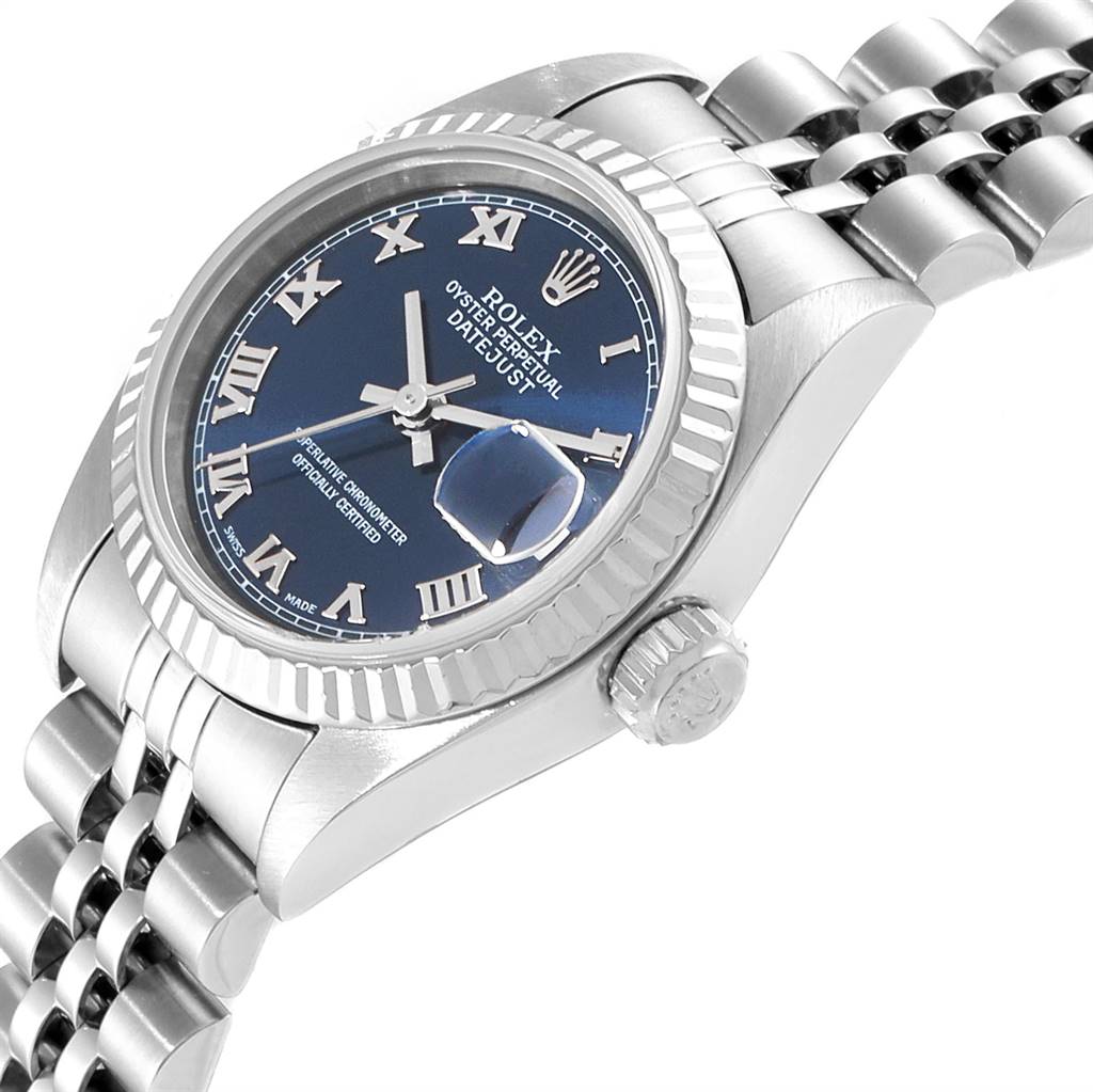 This image shows a Rolex Datejust 79174 Women's Stainless Steel Blue Dial 79174 Women's Stainless Steel Blue Dial watch from an angled close-up view, highlighting the face, bezel, crown, and part of the bracelet.