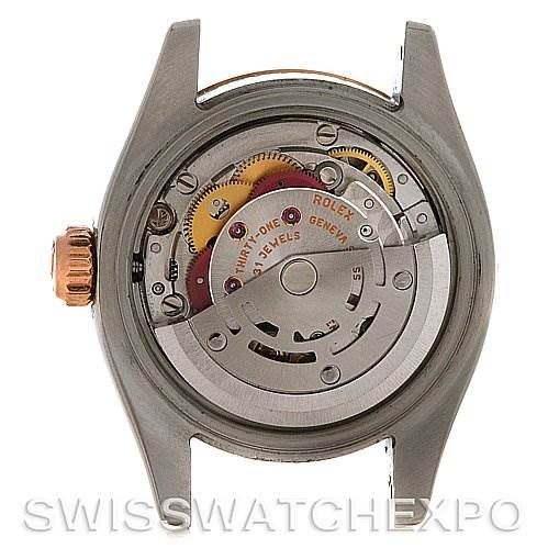 This image shows the inner mechanism and movement of a Rolex Datejust 179171 Women's Steel and Gold (two tone) Black Dial 179171 Women's Steel and Gold (two tone) Black Dial watch from a back angle with the case back removed.