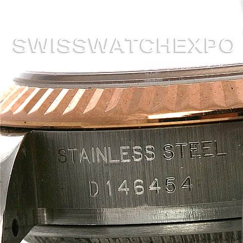 The image shows a close-up of the case side and bezel of a Rolex Datejust 179171 Women's Steel and Gold (two tone) Black Dial 179171 Women's Steel and Gold (two tone) Black Dial watch, highlighting the stainless steel engravings.