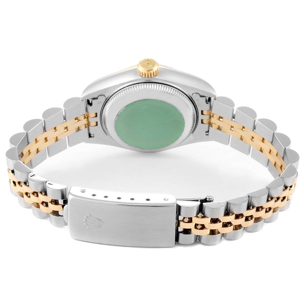 The image shows the back case and bracelet of a Rolex Datejust 69173 Women
s Stainless Steel Champagne Dial 69173 Women
s Stainless Steel Champagne Dial watch, highlighting the two-tone metal links and clasp.