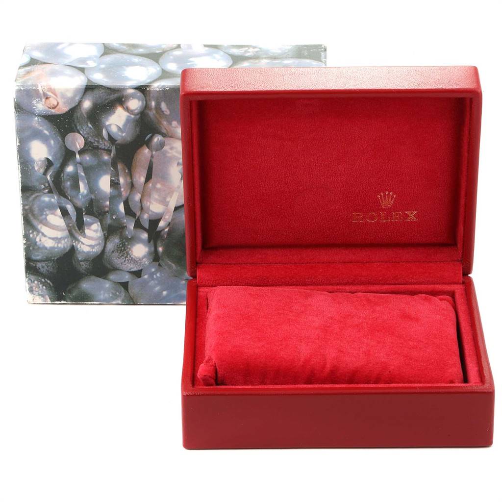 The image shows a red Rolex Datejust 79174 Women
s Stainless Steel Mother of Pearl Dial 79174 Women
s Stainless Steel Mother of Pearl Dial watch box open, with the inner cushion and outer packaging visible.