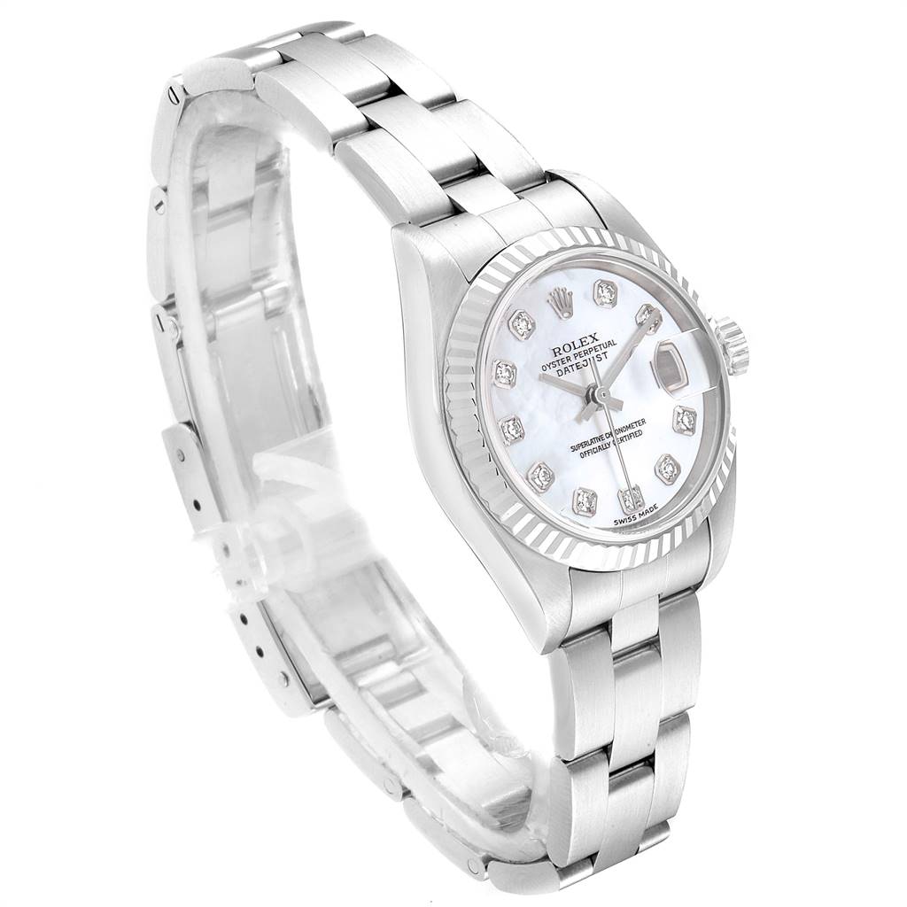 The image shows a Rolex Datejust 79174 Women
s Stainless Steel Mother of Pearl Dial 79174 Women
s Stainless Steel Mother of Pearl Dial watch from a three-quarter angle, highlighting its face, dial, fluted bezel, and bracelet.