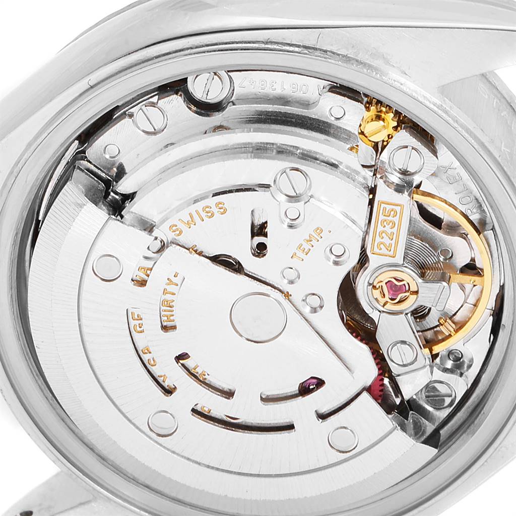 The image shows the intricate internal mechanism of a Rolex Datejust 79174 Women's Stainless Steel Pink Dial 79174 Women's Stainless Steel Pink Dial watch, viewed from the back with detailed components visible.