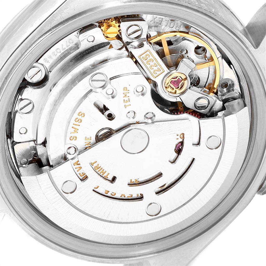 This image shows a detailed view of the Rolex Datejust 79174 Women
s Stainless Steel Silver Dial 79174 Women
s Stainless Steel Silver Dial movement
s inner workings and mechanical components from a back angle.