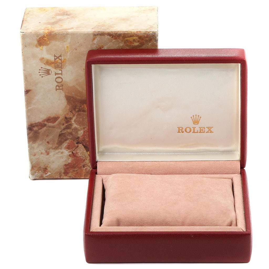 This image shows an empty Rolex Datejust 69173 Women's Stainless Steel Champagne Dial 69173 Women's Stainless Steel Champagne Dial watch box and its outer packaging taken from a frontal angle.