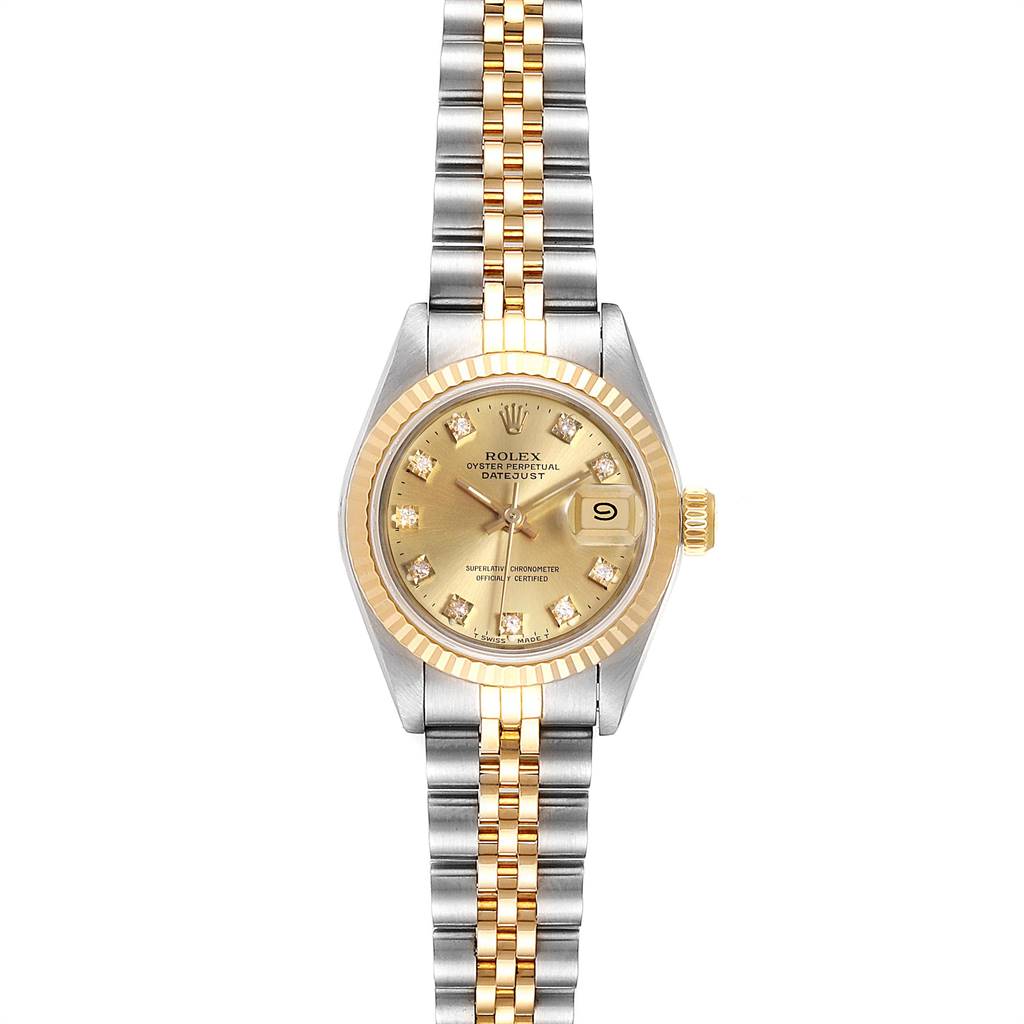 The Rolex Datejust 69173 Women's Stainless Steel Champagne Dial 69173 Women's Stainless Steel Champagne Dial model is shown from a top-down angle, highlighting its gold dial, fluted bezel, Jubilee bracelet, and date function.