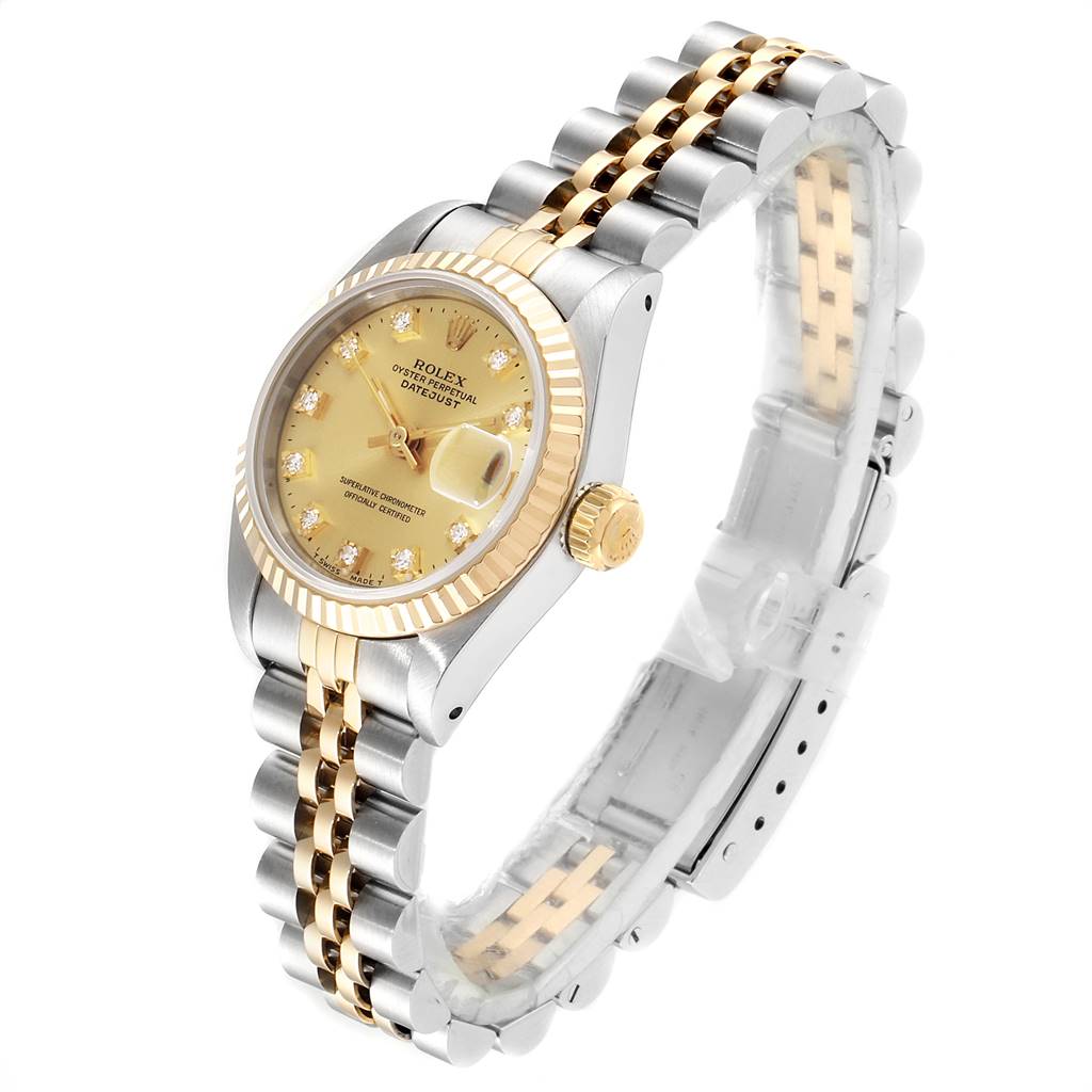 The image shows a gold and silver Rolex Datejust 69173 Women's Stainless Steel Champagne Dial 69173 Women's Stainless Steel Champagne Dial watch with a Jubilee bracelet, angled from the left side showcasing the dial and fluted bezel.