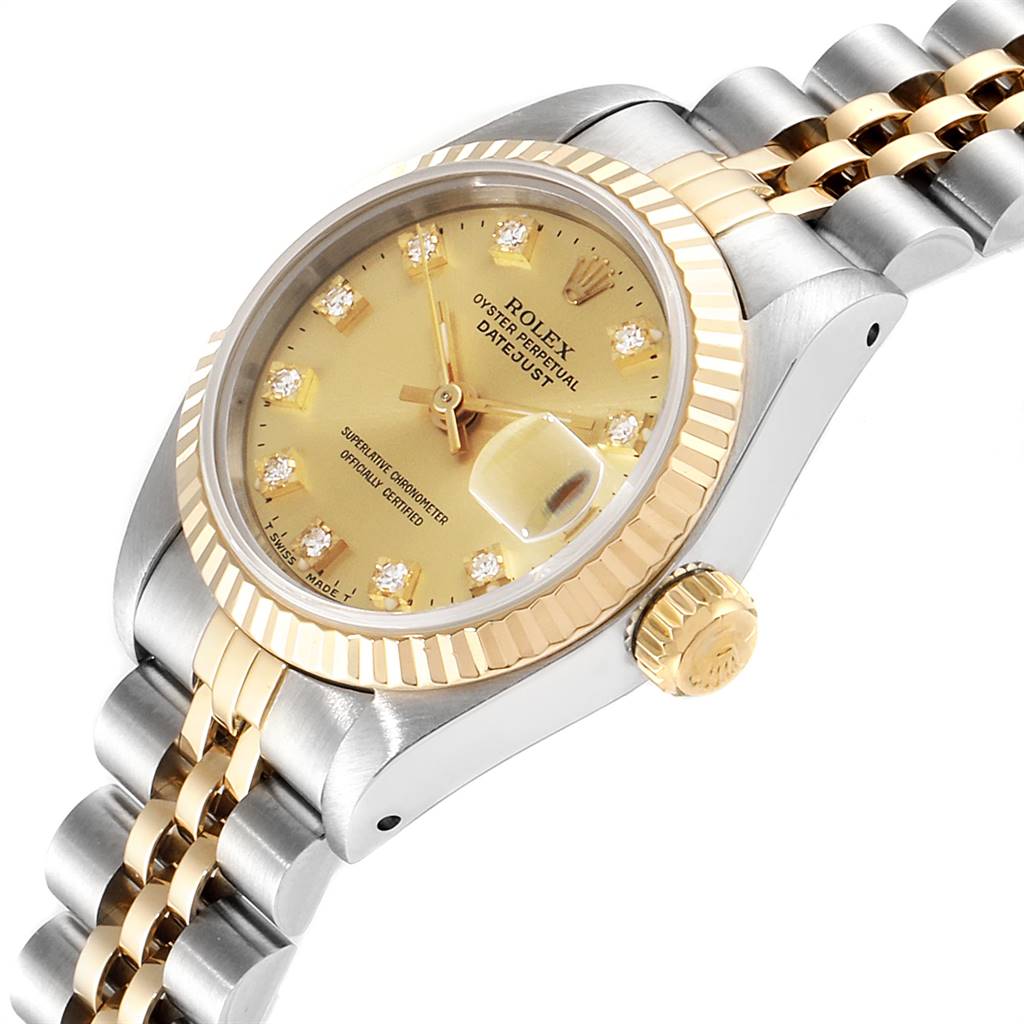 The image shows a close-up, side angle of a Rolex Datejust 69173 Women's Stainless Steel Champagne Dial 69173 Women's Stainless Steel Champagne Dial watch, highlighting the dial, crown, and bracelet.