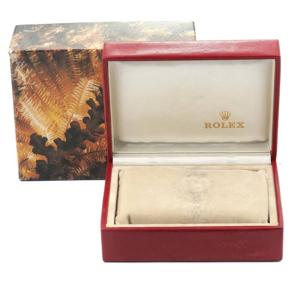 The image shows the open box and outer packaging of a Rolex Datejust 69173 Women
s Stainless Steel Black Dial 69173 Women
s Stainless Steel Black Dial watch, with no watch visible inside.