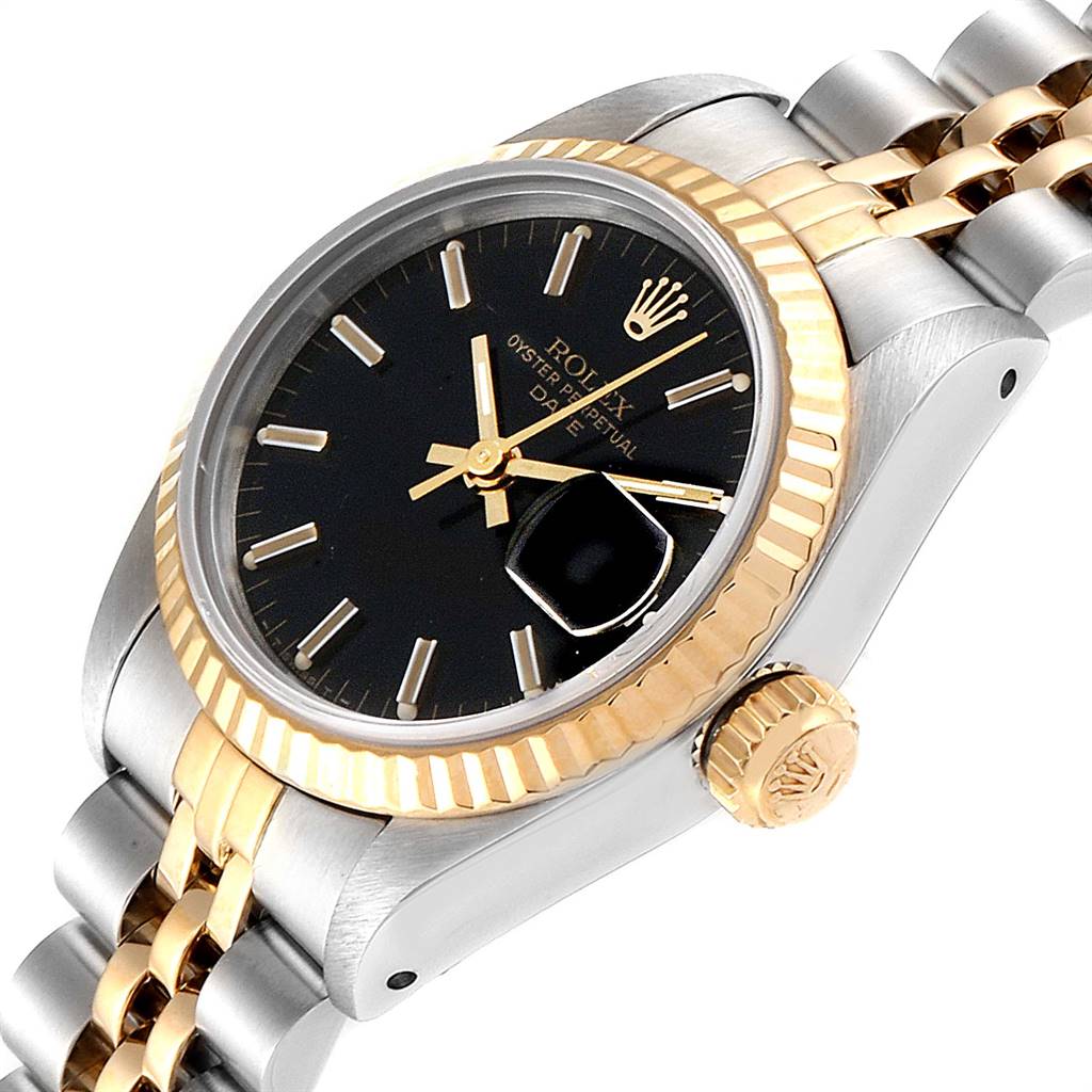 The image shows a Rolex Datejust 69173 Women
s Stainless Steel Black Dial 69173 Women
s Stainless Steel Black Dial watch from an angled side view, highlighting the bezel, crown, and part of the bracelet.