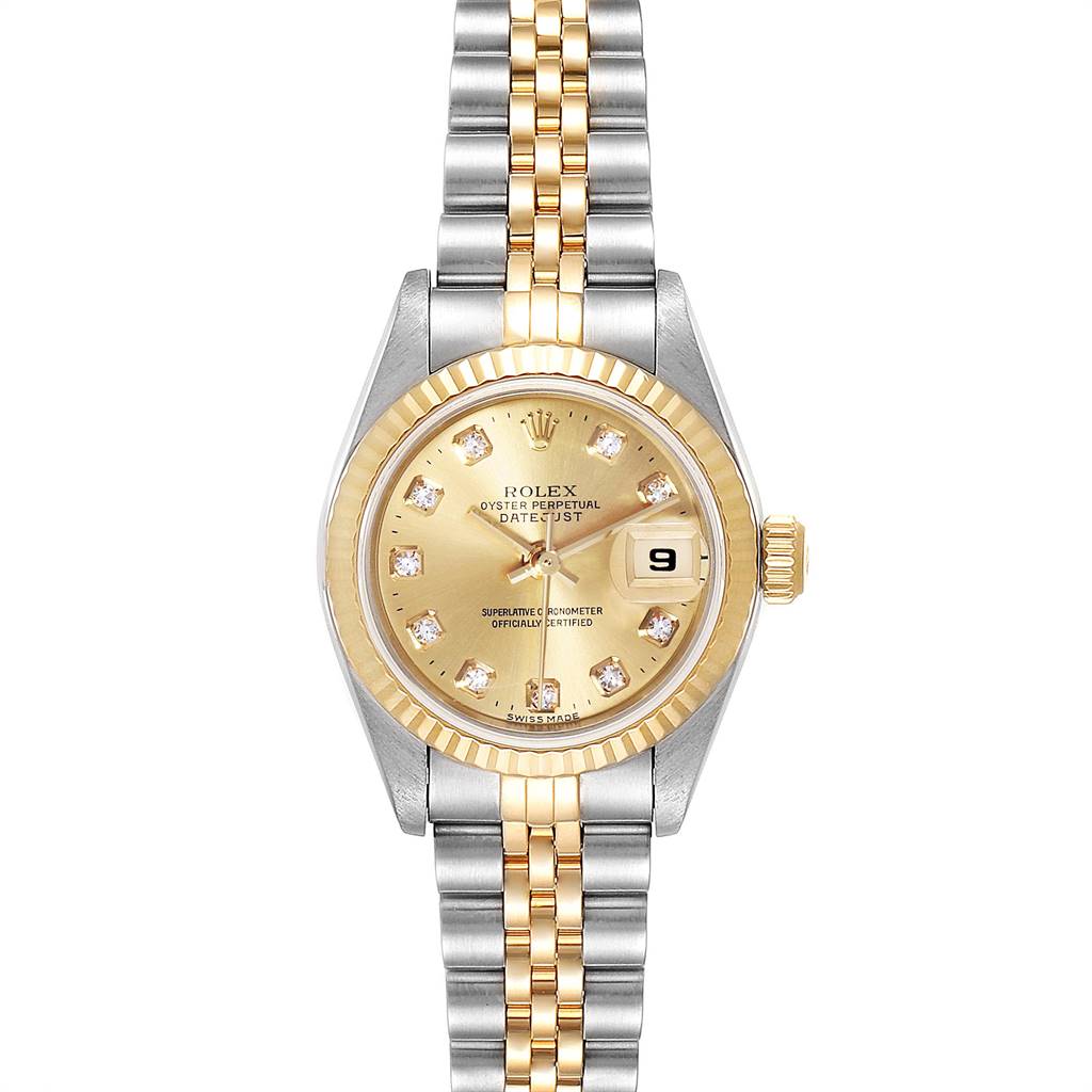 The image shows a Rolex Datejust 69173 Women's Stainless Steel Champagne Dial 69173 Women's Stainless Steel Champagne Dial watch, highlighting its champagne dial, fluted bezel, and two-tone Jubilee bracelet, from a top-down angle.