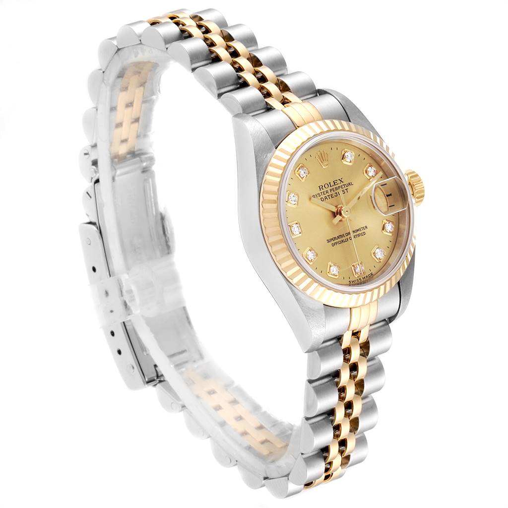 This image shows a side angle of the Rolex Datejust 69173 Women's Stainless Steel Champagne Dial 69173 Women's Stainless Steel Champagne Dial watch, highlighting its two-tone bracelet and gold dial.