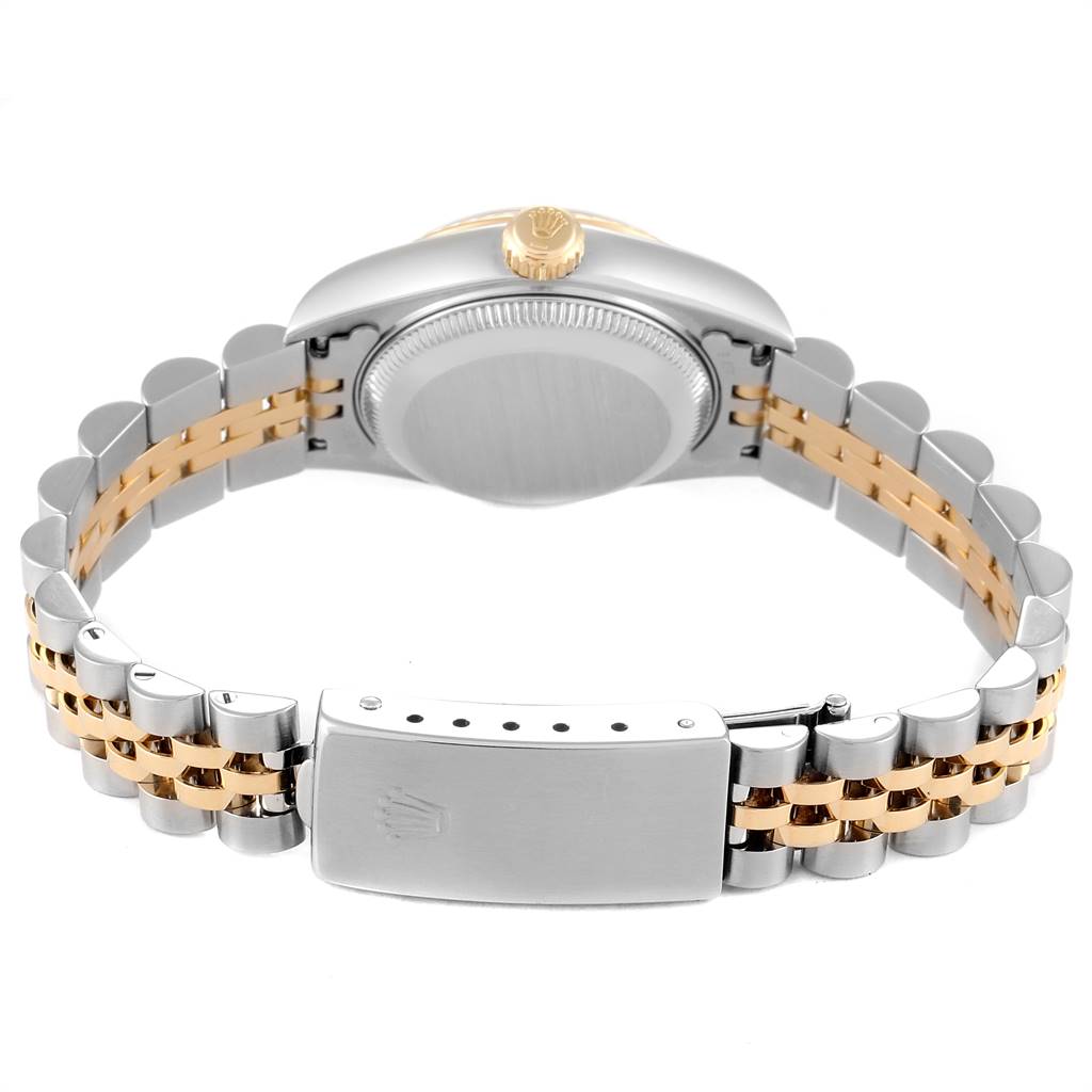This image shows the back of a Rolex Datejust 69173 Women's Stainless Steel Champagne Dial 69173 Women's Stainless Steel Champagne Dial watch, highlighting the clasp and the two-tone metal bracelet.