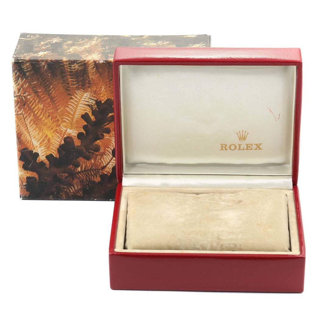 The image shows the open packaging box and pillow insert for a Rolex Datejust 69173 Women's Stainless Steel Champagne Dial 69173 Women's Stainless Steel Champagne Dial watch, with "ROLEX" branding inside the lid.