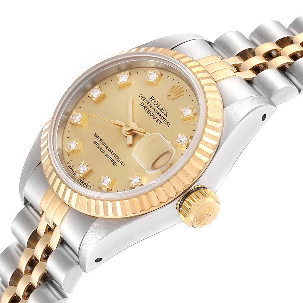 This Rolex Datejust 69173 Women's Stainless Steel Champagne Dial 69173 Women's Stainless Steel Champagne Dial watch is shown at an angle highlighting the dial, crown, fluted bezel, and Jubilee bracelet.