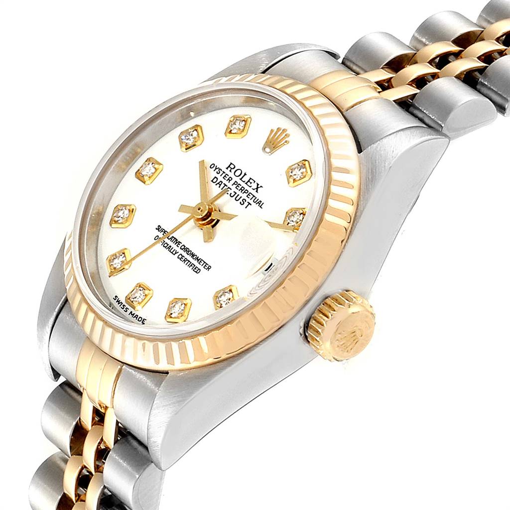 The image shows a tilted side view of a Rolex Datejust 79173 Women's Stainless Steel White Dial 79173 Women's Stainless Steel White Dial watch, highlighting its dial, crown, and part of the bracelet.