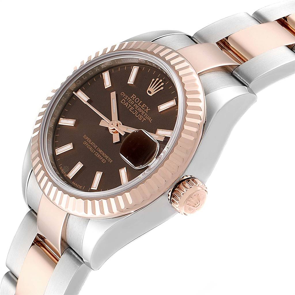 The Rolex Datejust 279171 Women's Steel and Gold (two tone) Brown Dial 279171 Women's Steel and Gold (two tone) Brown Dial is shown from an angled side view, highlighting the dial, crown, bezel, and part of the two-tone bracelet.