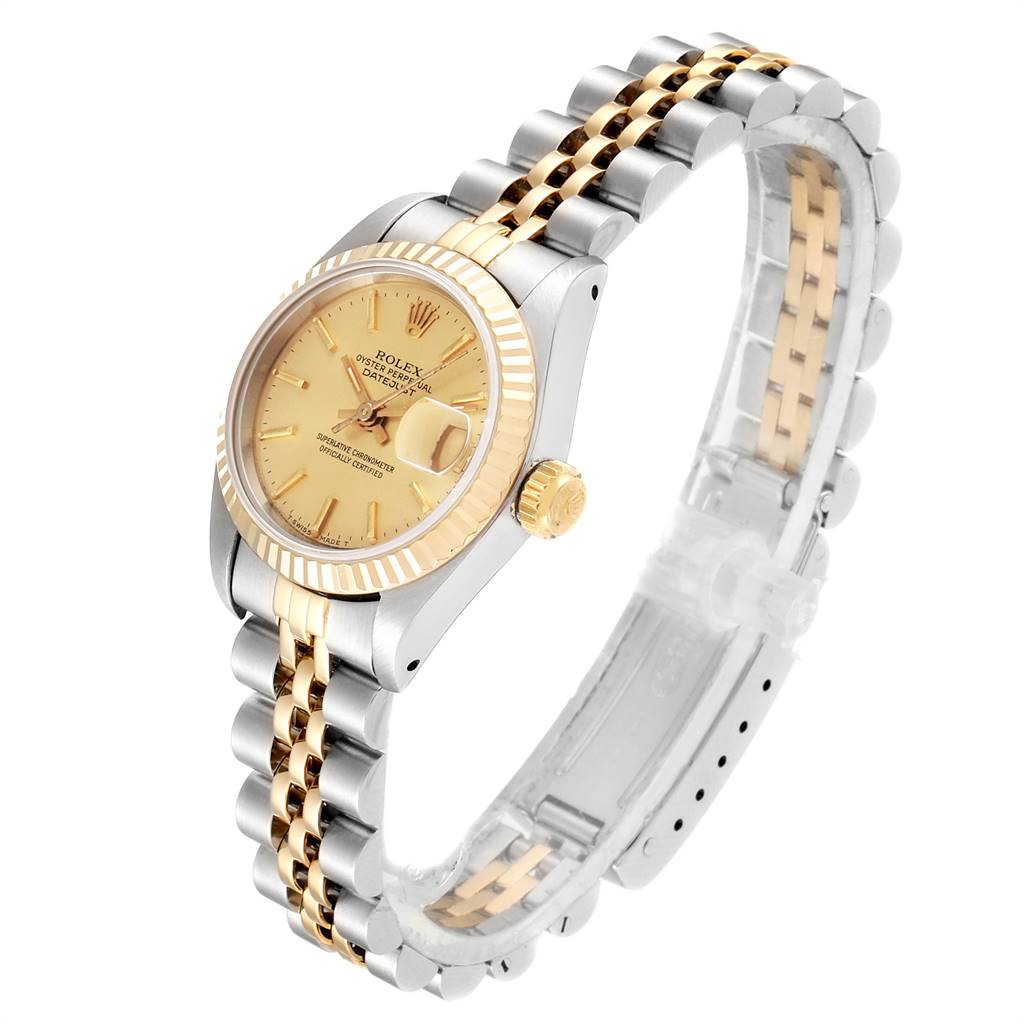 This image shows a side angle of a Rolex Datejust 69173 Women's Stainless Steel Champagne Dial 69173 Women's Stainless Steel Champagne Dial watch, highlighting the dial, bezel, crown, and Jubilee bracelet.