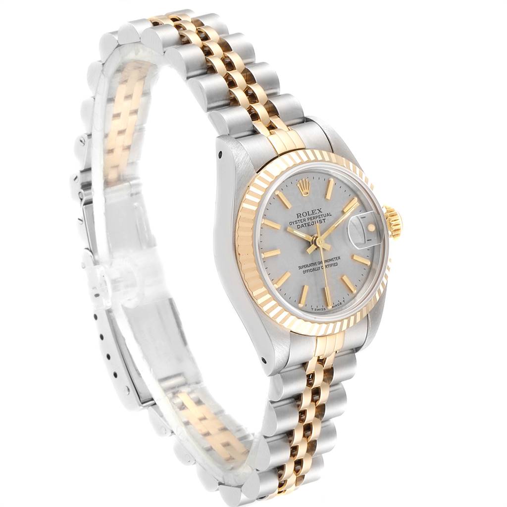 The Rolex Datejust 69173 Women
s Stainless Steel Silver Dial 69173 Women
s Stainless Steel Silver Dial watch is shown at an angled view displaying the silver-and-gold bracelet, dial, and fluted bezel.
