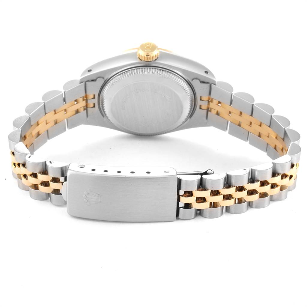 The image shows the backside of a Rolex Datejust 69173 Women
s Stainless Steel Silver Dial 69173 Women
s Stainless Steel Silver Dial watch, highlighting its clasp, bracelet, case back, and crown.