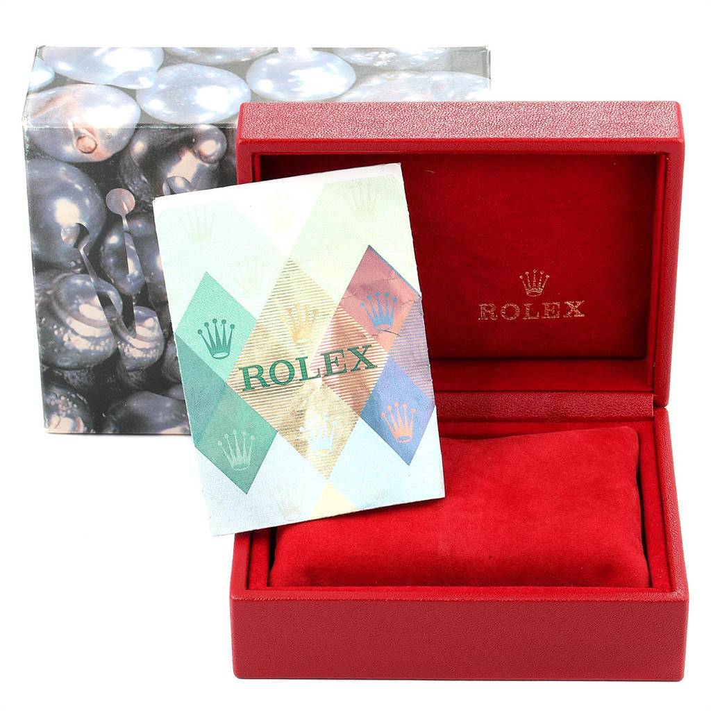 This image shows a Rolex Datejust 79174 Women
s Stainless Steel Mother of Pearl Dial 79174 Women
s Stainless Steel Mother of Pearl Dial model watch box, packaging, and warranty card from a top angle.