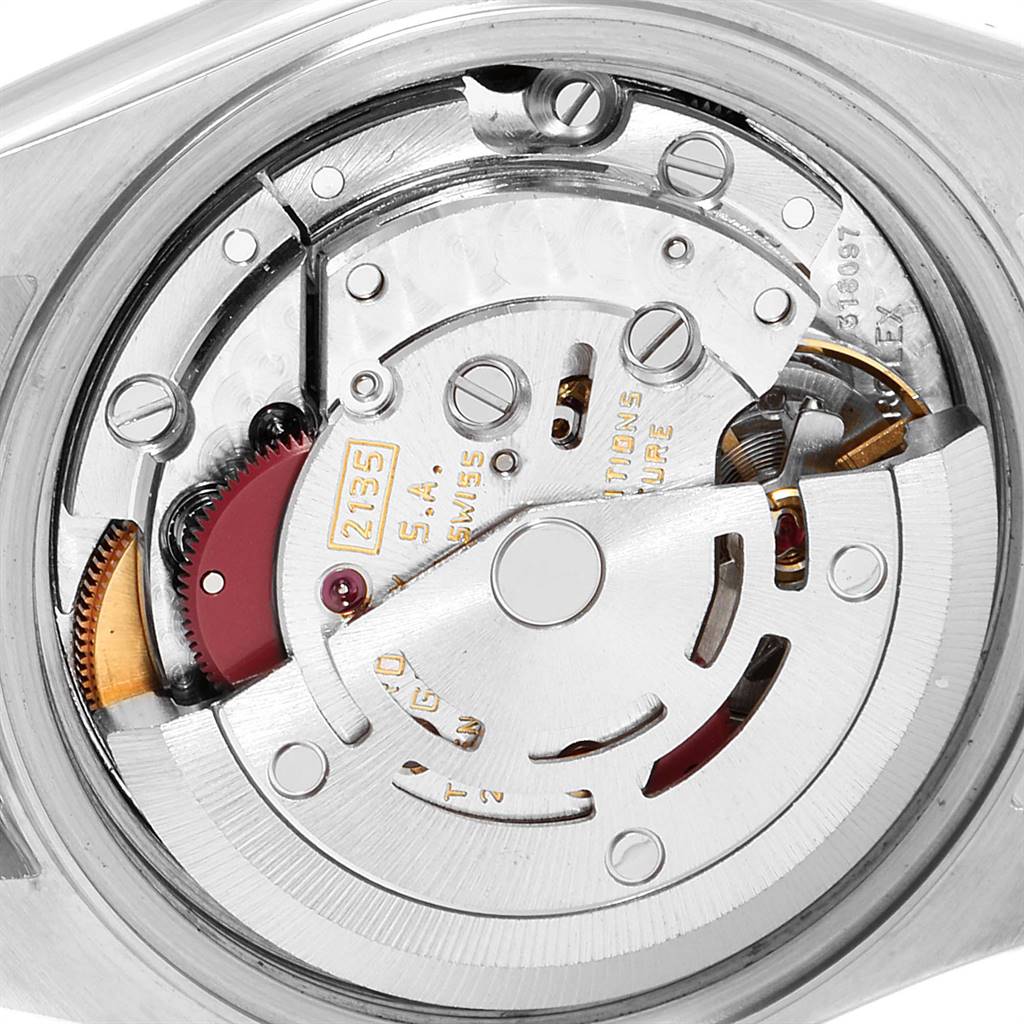 This is the back view of a Rolex Datejust 69173 Women's Stainless Steel Champagne Dial 69173 Women's Stainless Steel Champagne Dial watch, showing its internal mechanical movement and components.