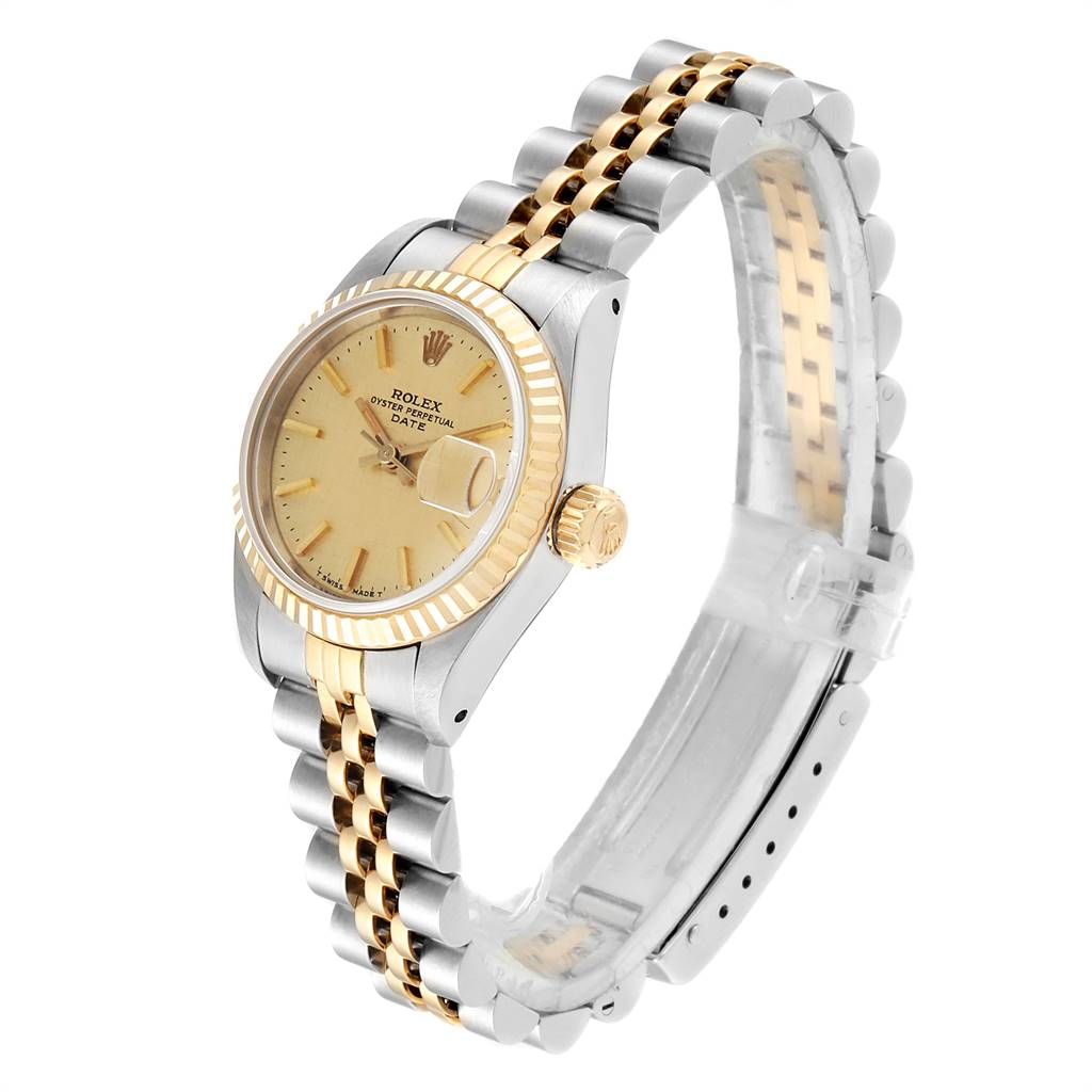 This Rolex Datejust 69173 Women's Stainless Steel Champagne Dial 69173 Women's Stainless Steel Champagne Dial watch is displayed at an angle showing the dial, bezel, crown, and two-tone bracelet.