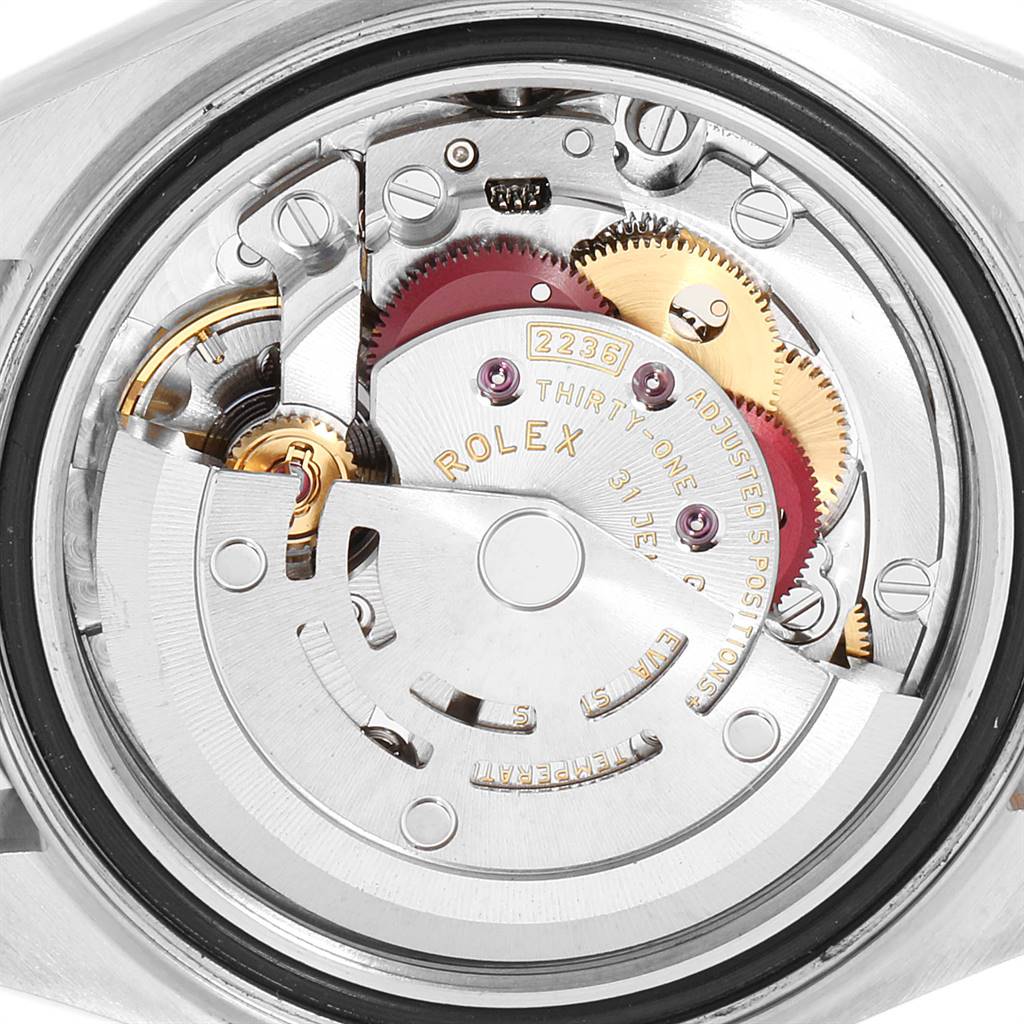 The image shows the internal mechanism of a Rolex Datejust 279173 Women's Steel and Gold (two tone) Purple Dial 279173 Women's Steel and Gold (two tone) Purple Dial watch from a rear angle, highlighting gears and movement components.
