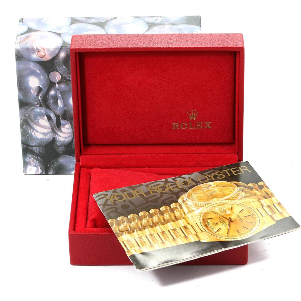 This image shows a Rolex Datejust 79173 Women
s Stainless Steel Blue Dial 79173 Women
s Stainless Steel Blue Dial watch box with a brochure, shot from the front angle.