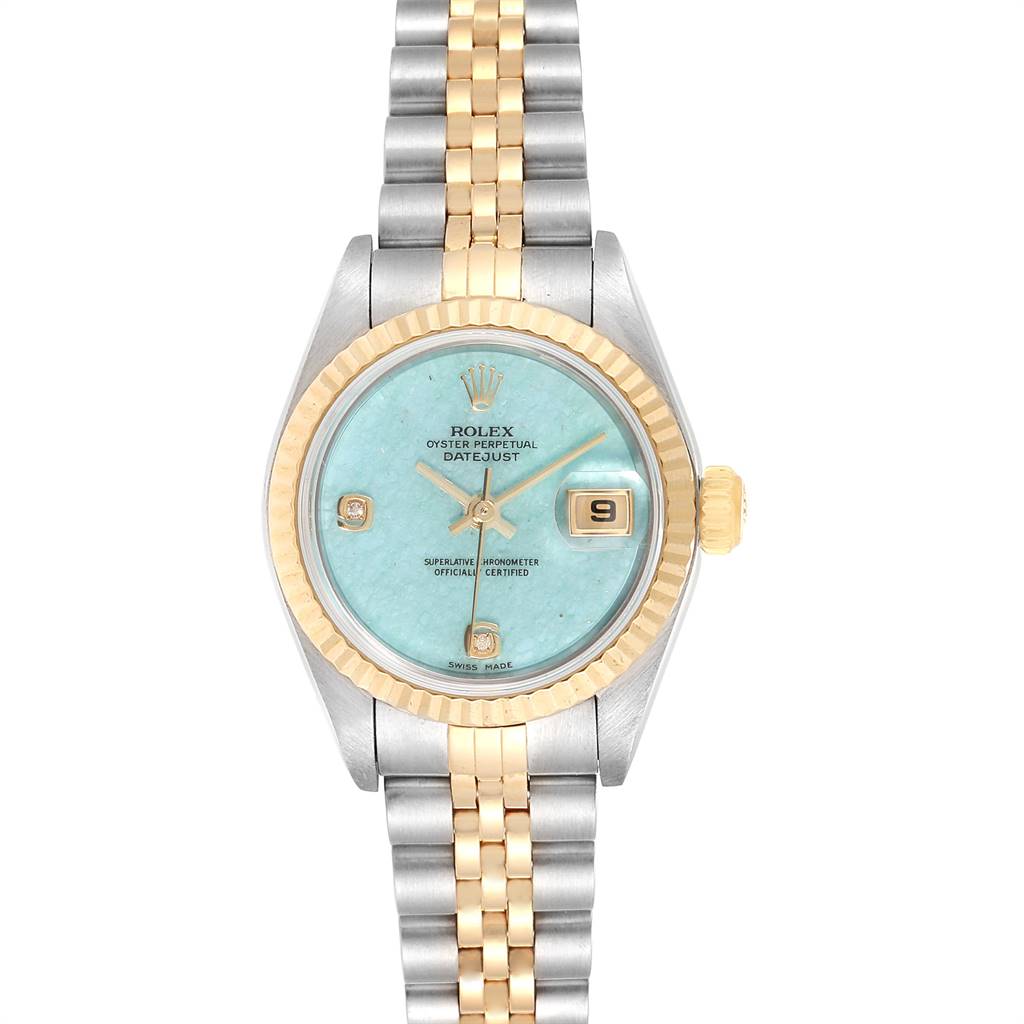 The image shows a front view of a Rolex Datejust 79173 Women
s Stainless Steel Blue Dial 79173 Women
s Stainless Steel Blue Dial watch, featuring a blue dial, gold bezel, and two-tone bracelet.