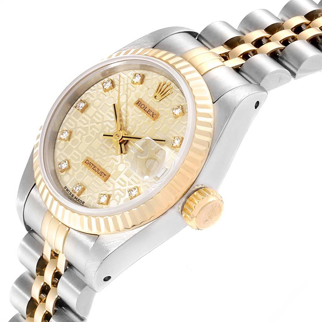 This image shows a side angle of a Rolex Datejust 69173 Women's Stainless Steel Beige Dial 69173 Women's Stainless Steel Beige Dial watch displaying its crown, bezel, dial, and bracelet.