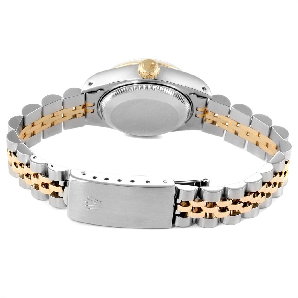 The image shows the rear view of a Rolex Datejust 69173 Women's Stainless Steel Beige Dial 69173 Women's Stainless Steel Beige Dial watch, highlighting the case back, crown, and two-tone bracelet clasp.