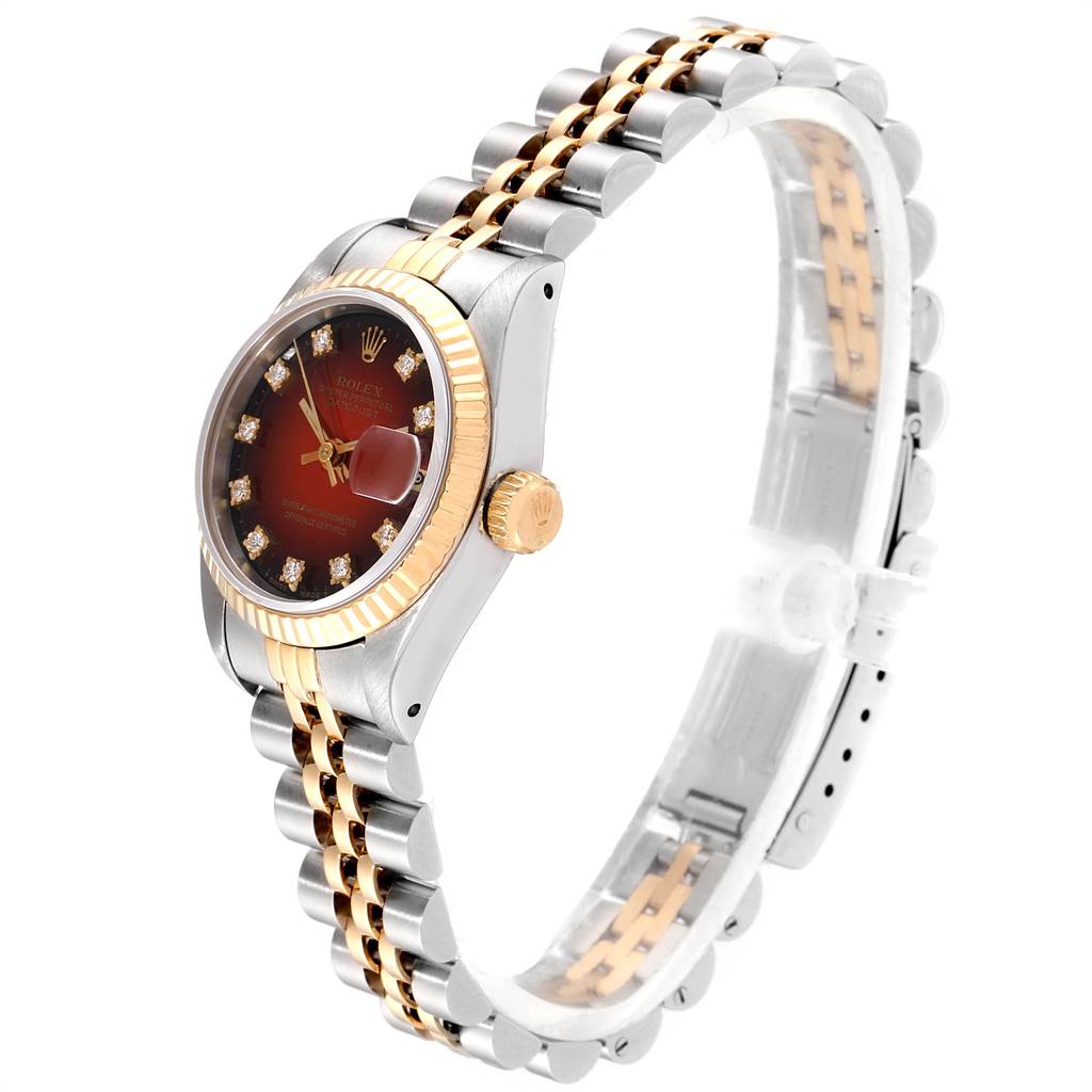 The Rolex Datejust 69173 Women's Stainless Steel Red Dial 69173 Women's Stainless Steel Red Dial watch is shown from a side angle, displaying its case, crown, and Jubilee bracelet.