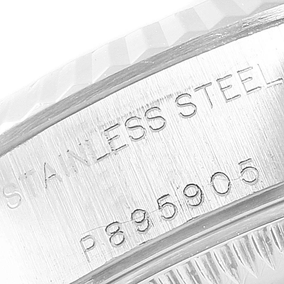 This image shows a close-up of the stainless steel case back with engravings on a Rolex Datejust 79174 Women
s Stainless Steel Silver Dial 79174 Women
s Stainless Steel Silver Dial watch.