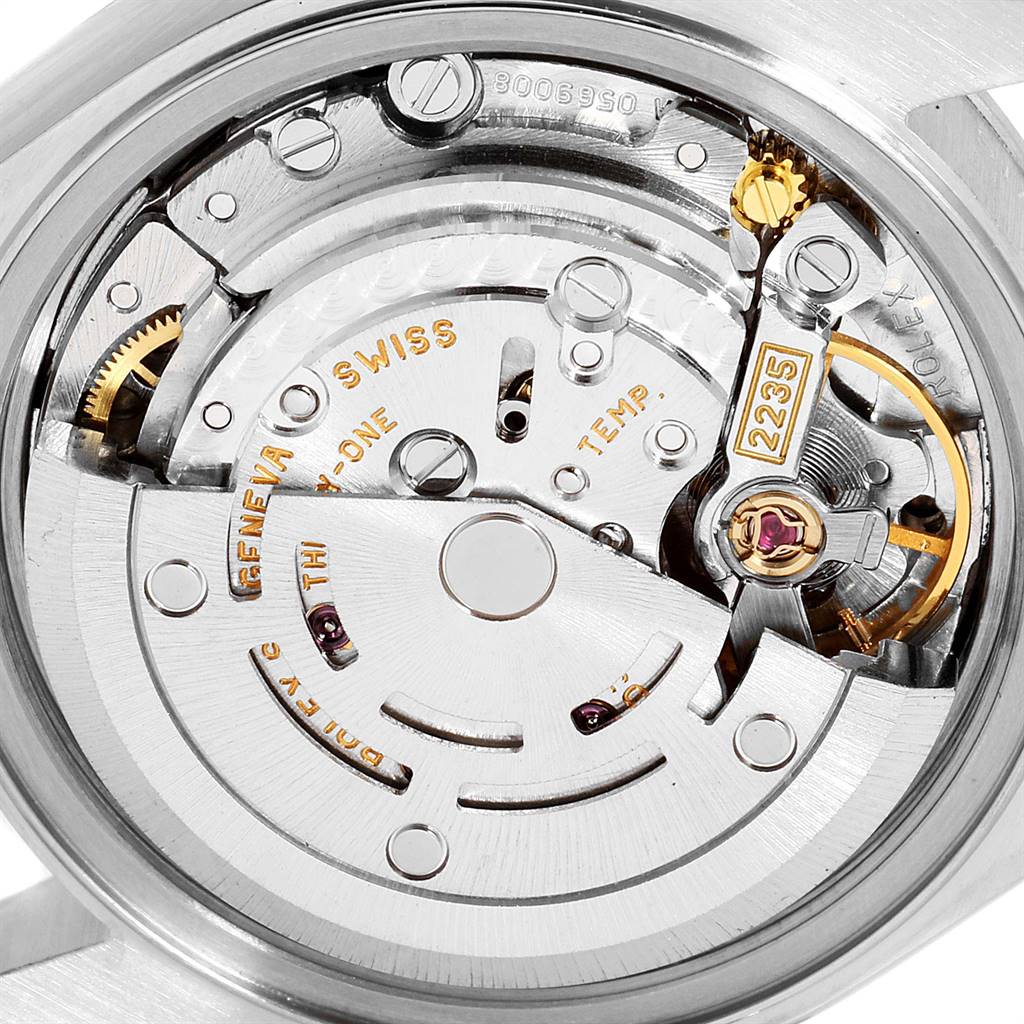 This image shows an up-close view of the movement mechanism inside a Rolex Datejust 79174 Women
s Stainless Steel Silver Dial 79174 Women
s Stainless Steel Silver Dial watch.