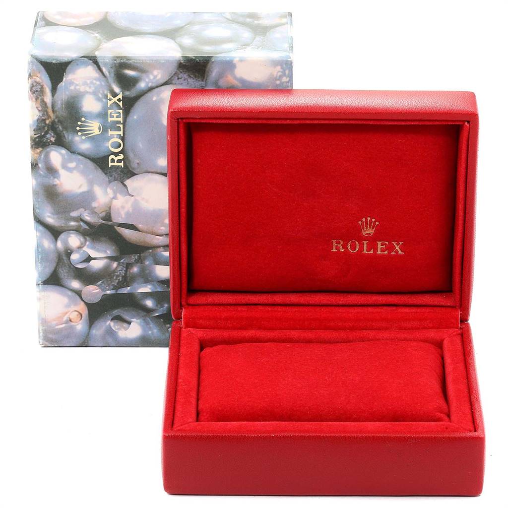 This image shows an empty Rolex Datejust 79174 Women
s Stainless Steel Silver Dial 79174 Women
s Stainless Steel Silver Dial watch box angled from the front, with a decorative outer box and a red interior.
