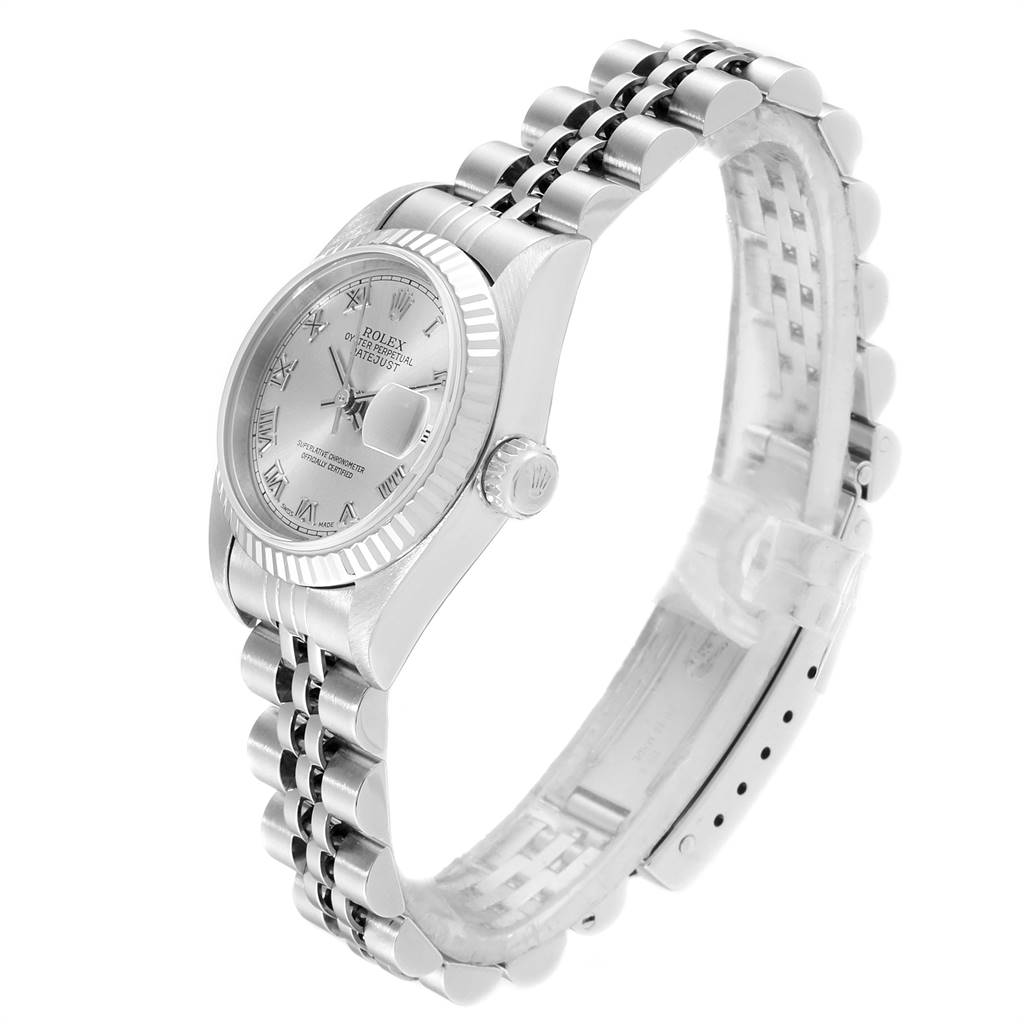 The Rolex Datejust 79174 Women
s Stainless Steel Silver Dial 79174 Women
s Stainless Steel Silver Dial watch is shown in a side angle highlighting the face, bezel, and bracelet.