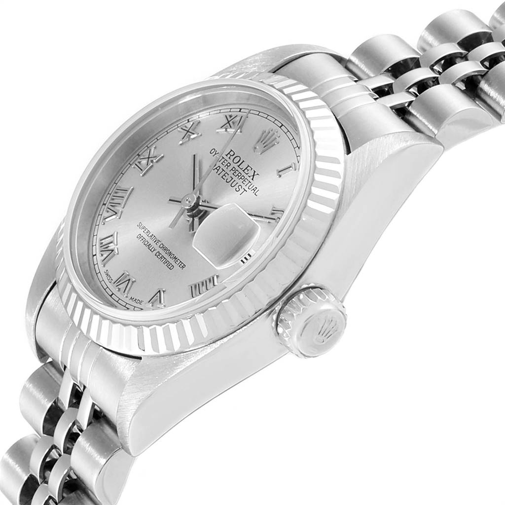 The image shows a side view of the Rolex Datejust 79174 Women
s Stainless Steel Silver Dial 79174 Women
s Stainless Steel Silver Dial model, displaying the watch face, crown, and part of the bracelet.