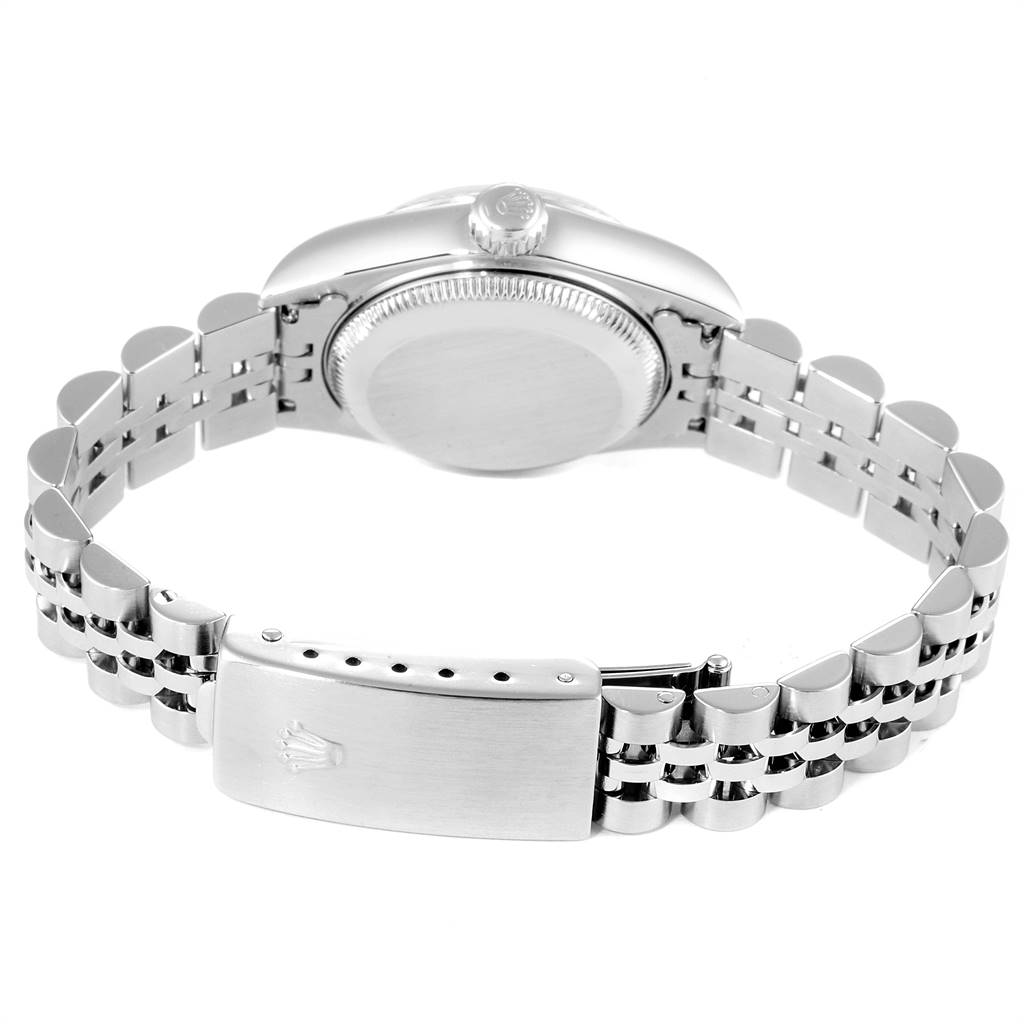 The image shows the back case and bracelet clasp of a Rolex Datejust 79174 Women
s Stainless Steel Silver Dial 79174 Women
s Stainless Steel Silver Dial watch.