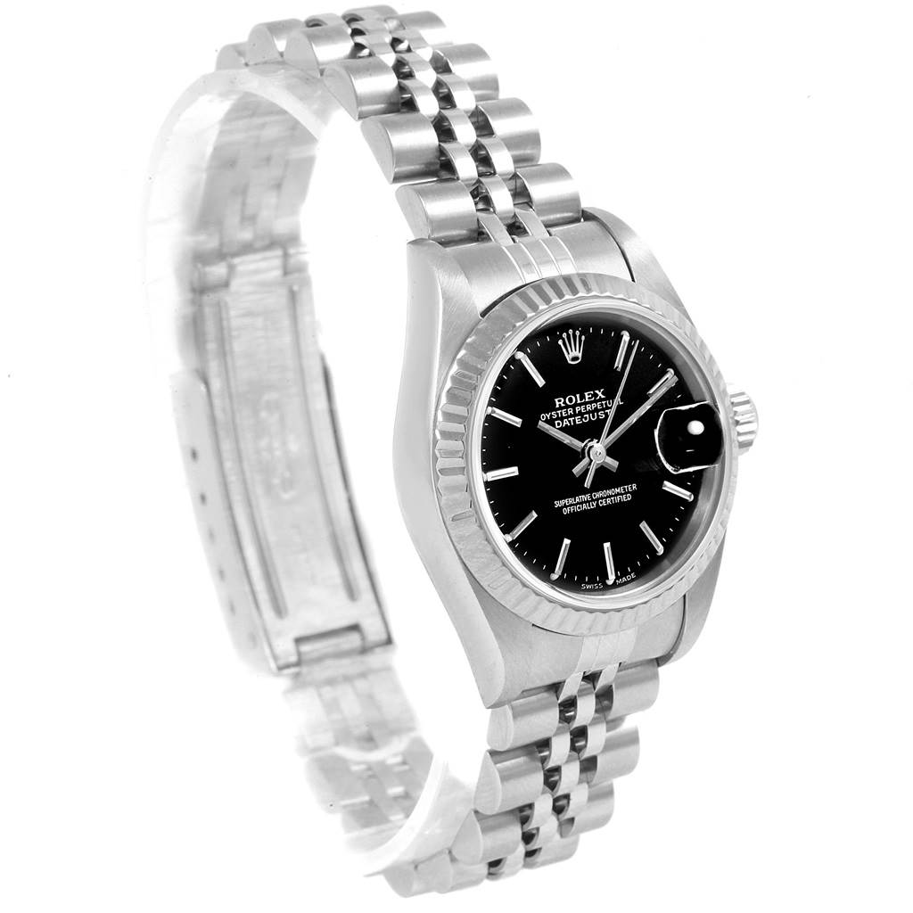 The image shows a side angle of the Rolex Datejust 79174 Women
s Stainless Steel Black Dial 79174 Women
s Stainless Steel Black Dial watch, highlighting its face, bezel, and Jubilee bracelet.