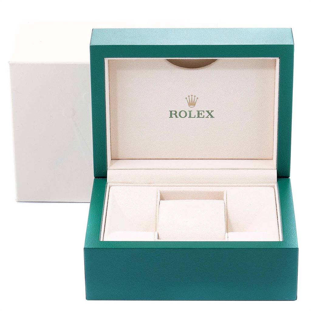 This image shows an open green and beige watch box for a Rolex Datejust 179384 Women
s Stainless Steel Black Dial 179384 Women
s Stainless Steel Black Dial model, highlighting the interior design.