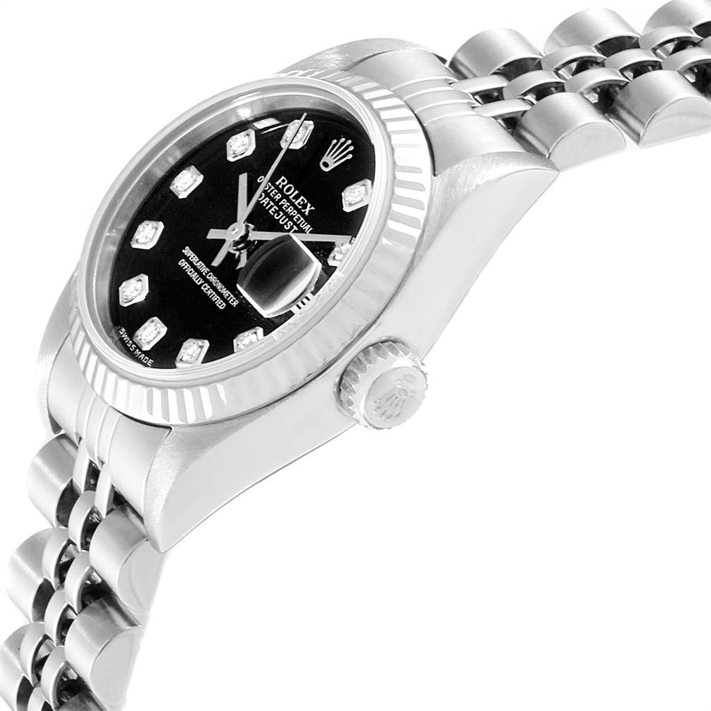 This image shows a Rolex Datejust 79174 Women
s Stainless Steel Black Dial 79174 Women
s Stainless Steel Black Dial watch at a tilted angle, highlighting the dial, crown, and part of the bracelet.