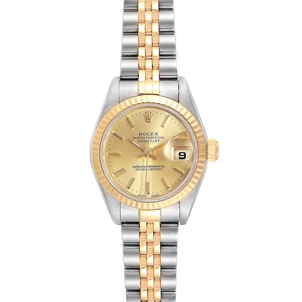 The image shows a Rolex Datejust 79173 Women's Steel and Gold (two tone) Champagne Dial 79173 Women's Steel and Gold (two tone) Champagne Dial watch from a top-down angle, highlighting its dial, bracelet, and crown.