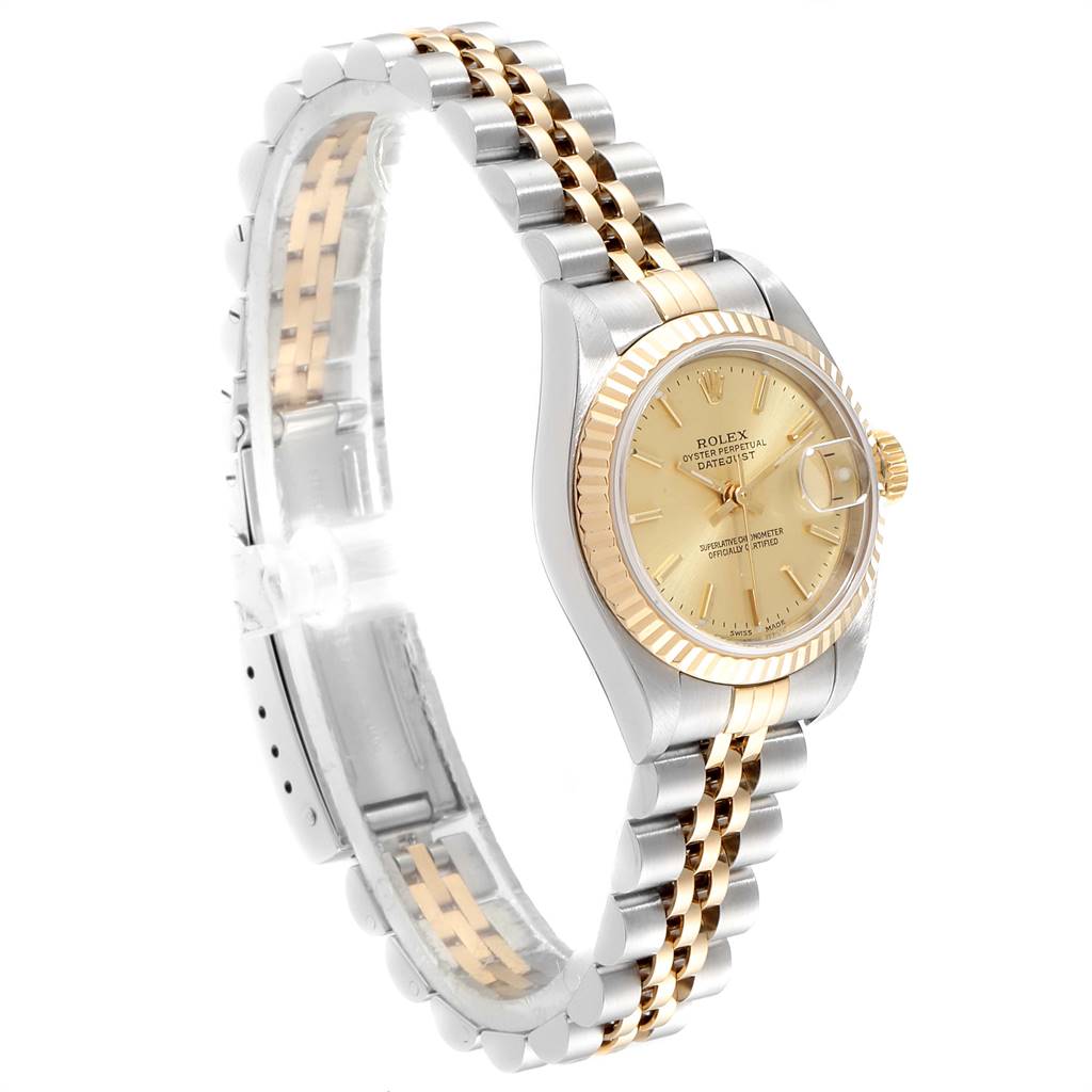 The image shows a Rolex Datejust 79173 Women's Steel and Gold (two tone) Champagne Dial 79173 Women's Steel and Gold (two tone) Champagne Dial watch from a side-angle, displaying the two-tone bracelet, gold fluted bezel, and champagne dial.