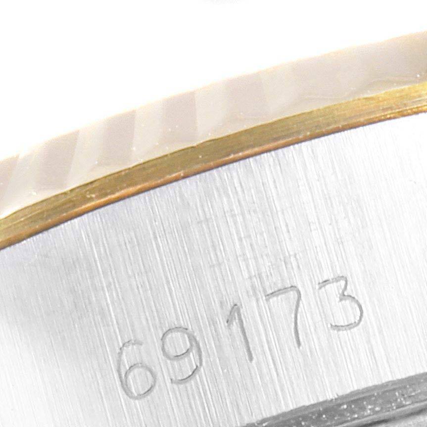 This image shows a close-up of the side of a Rolex Datejust 69173 Women's Stainless Steel White Dial 69173 Women's Stainless Steel White Dial model, highlighting the engraved model number 69173.